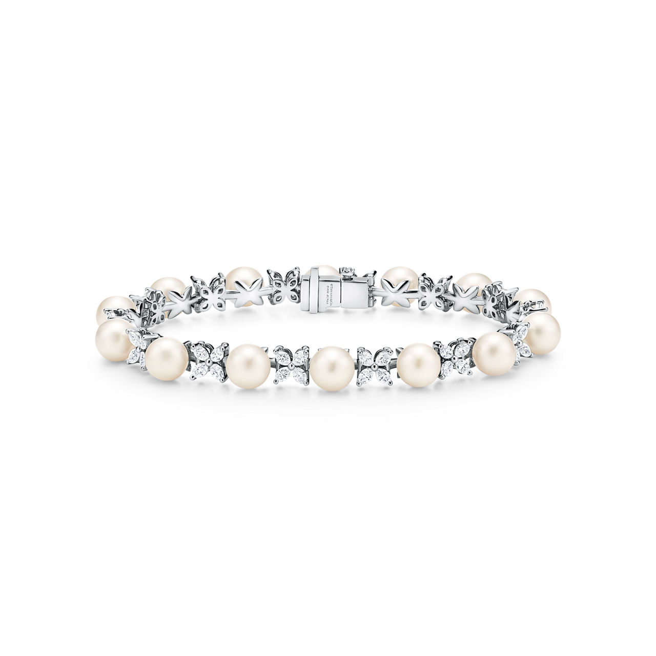 Tennis Bracelet in Platinum with Diamonds and Pearls