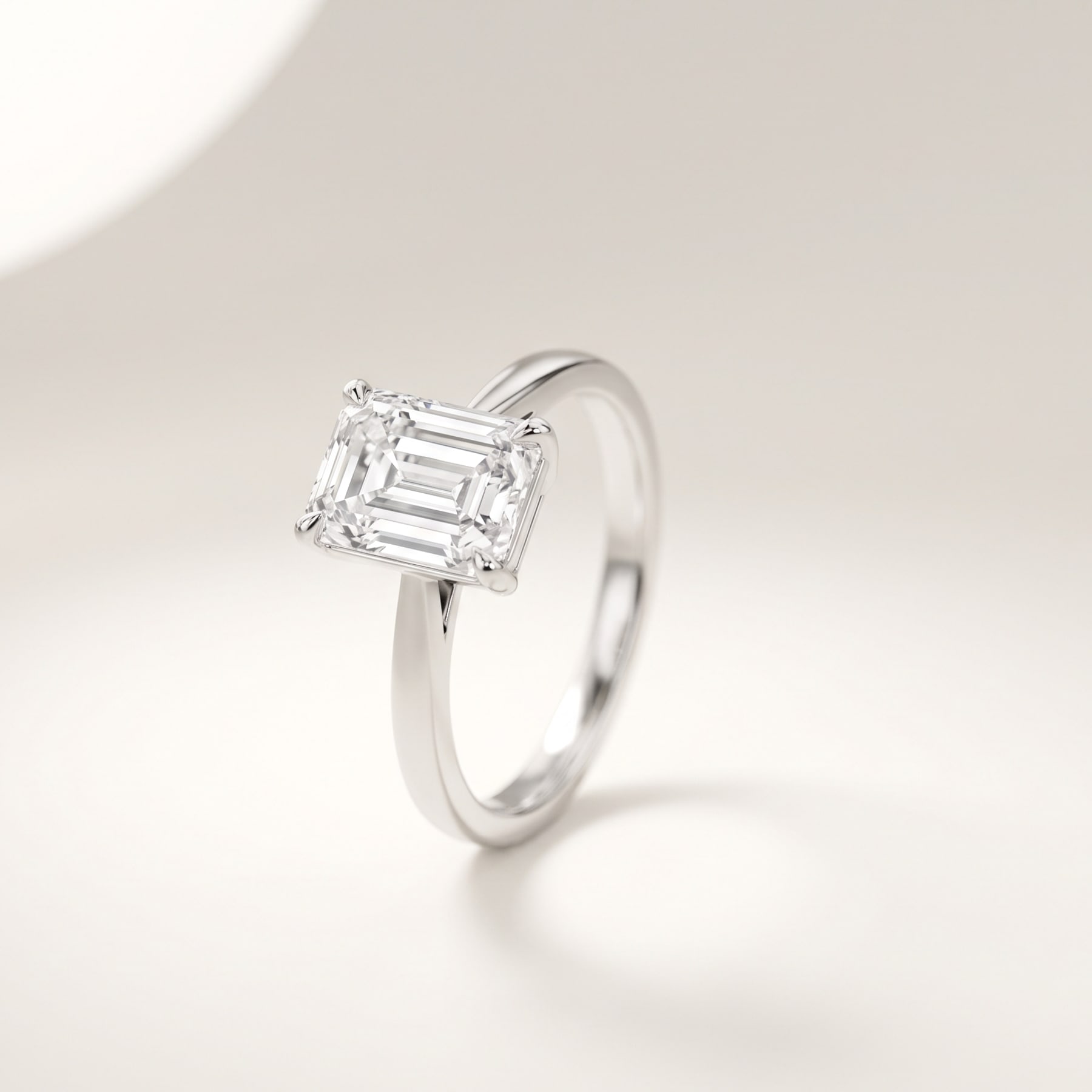 Emerald Cut Ring, in 18k White Gold with a Step-Cut Diamond
