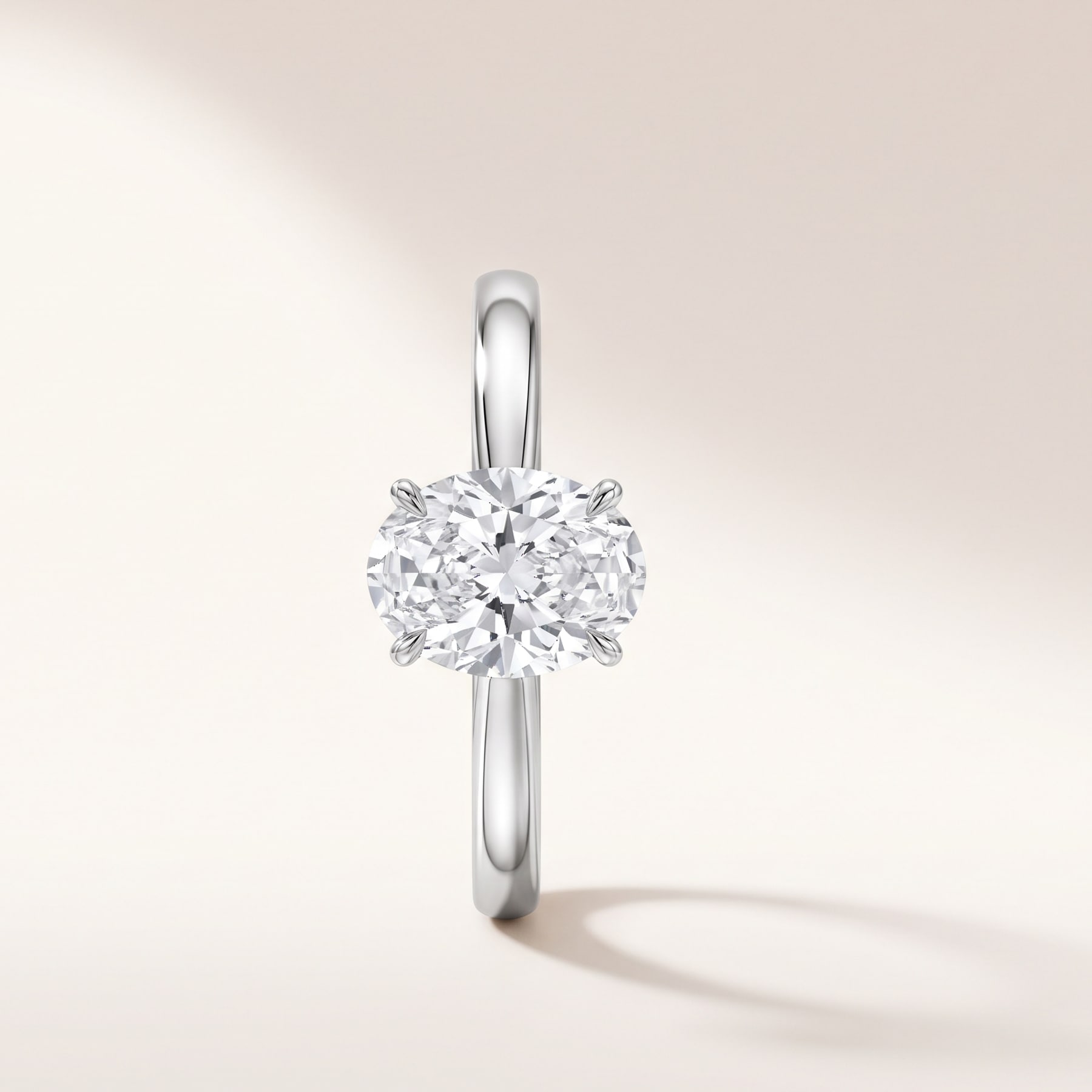 Oval Solitaire, in Platinum with an Oval-Cut Diamond