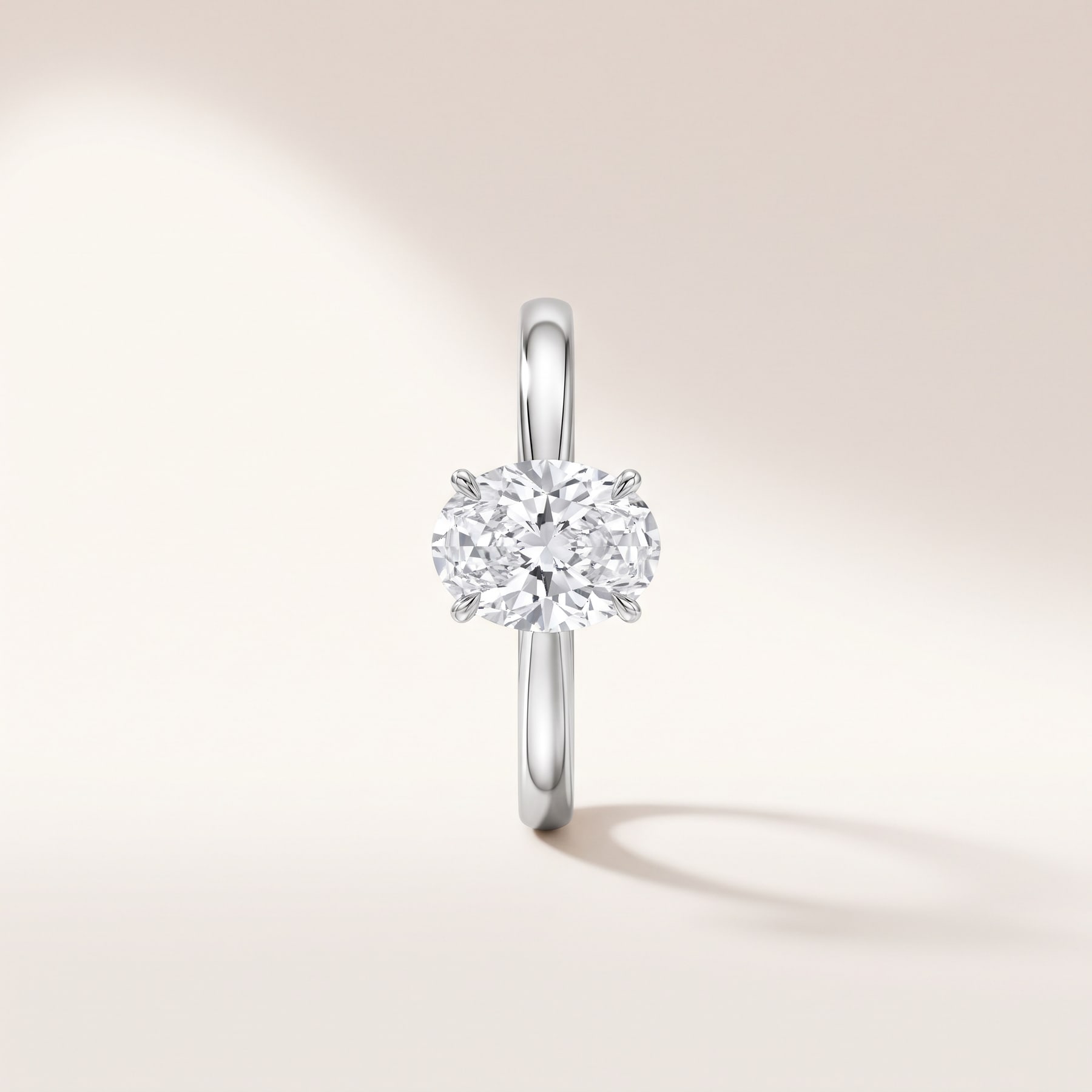 Oval Solitaire, in Platinum with an Oval-Cut Diamond