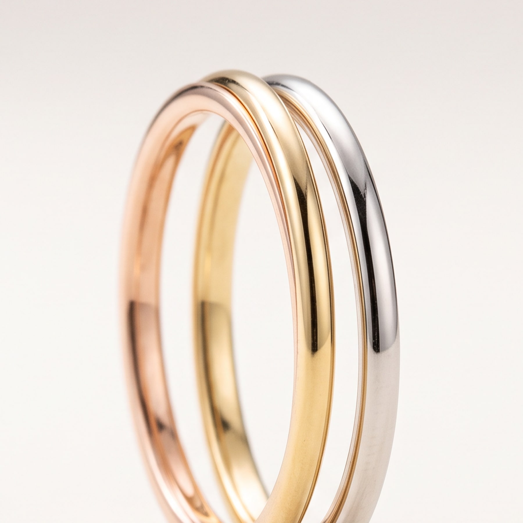 Interlocking Ring, in 18k Rose, Yellow and White Gold