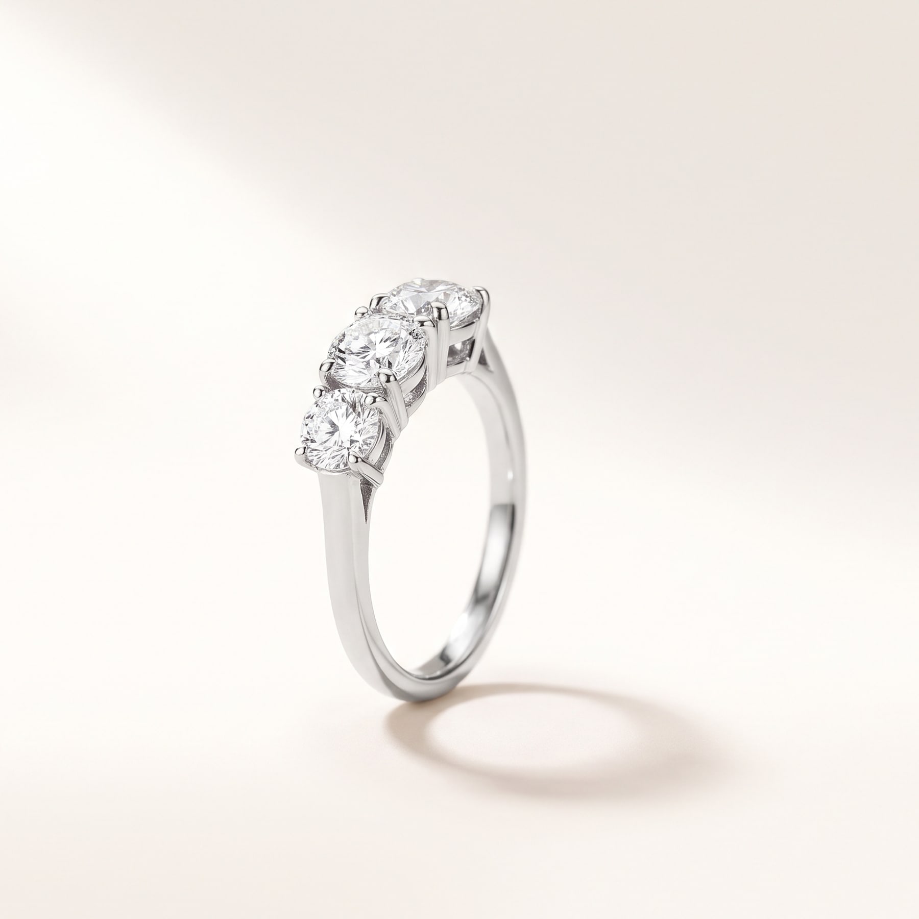 Three Stone Ring, in Platinum with Brilliant-Cut Diamonds